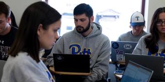 Students working on laptops